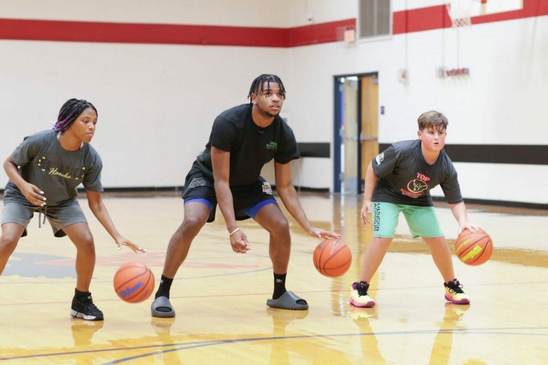 Jaden Hardy at a July 2022 basketball practice with Top Achievers' students