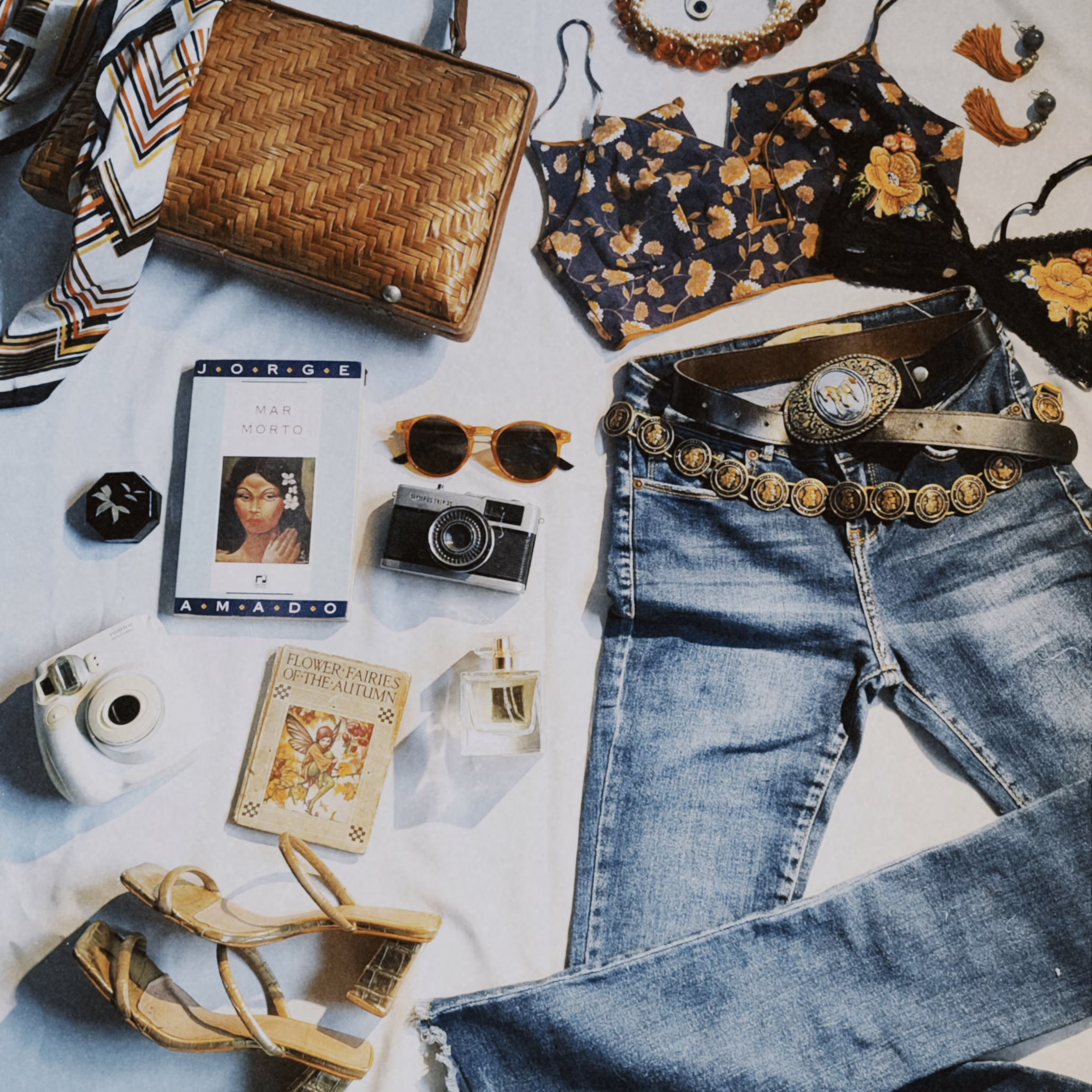 Charity fundraiser auction event with bidders and donated items on display.