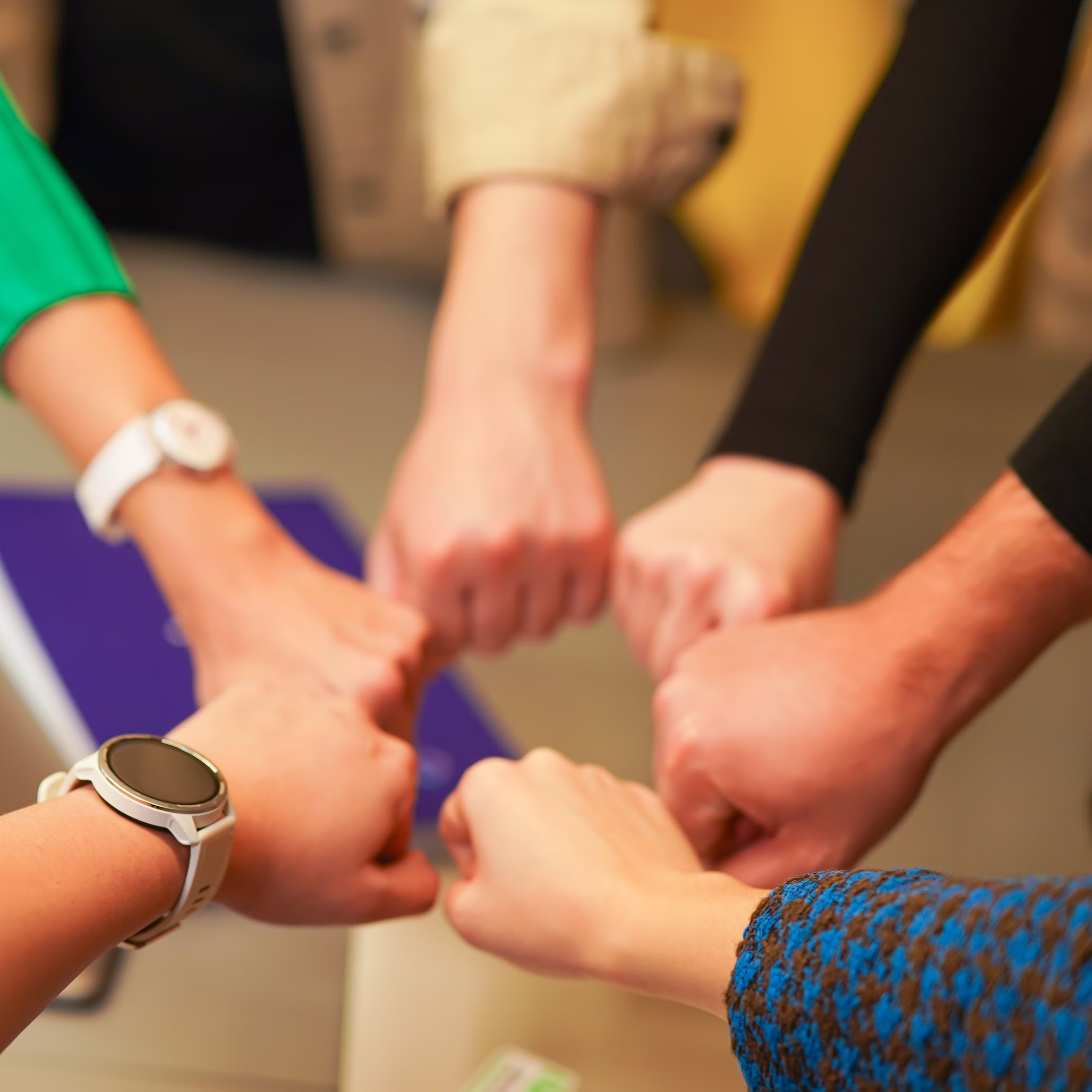 Corporate fundraiser event with company employees networking and supporting charity causes.