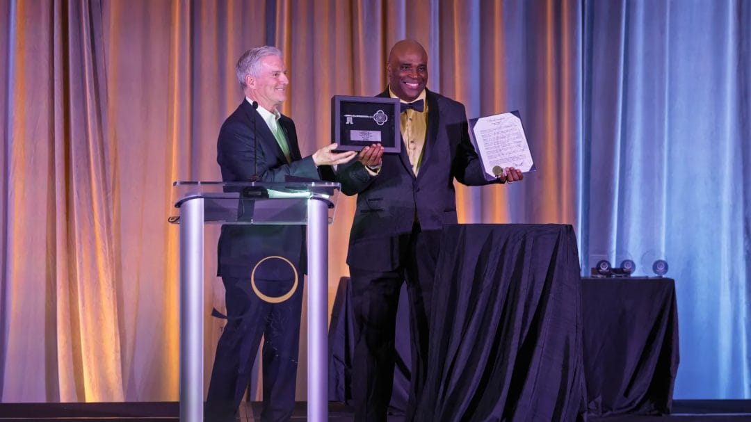 City of Plano Honors Lawrence Mann with Key to the City and Declares May 1, 2026, "Lawrence Mann Day" 1 Lawrence Mann receives the Key to the City from Plano Mayor John Muns at the Top Achievers Foundation 30th Anniversary Gala, May 1, 2026.